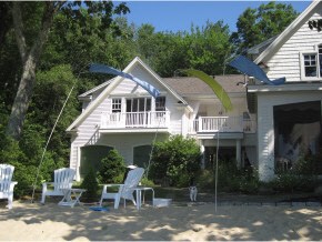 Custom designed home is lake living at its best. M