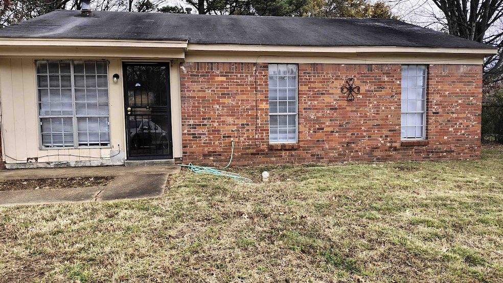 Exterior space featuring a yard