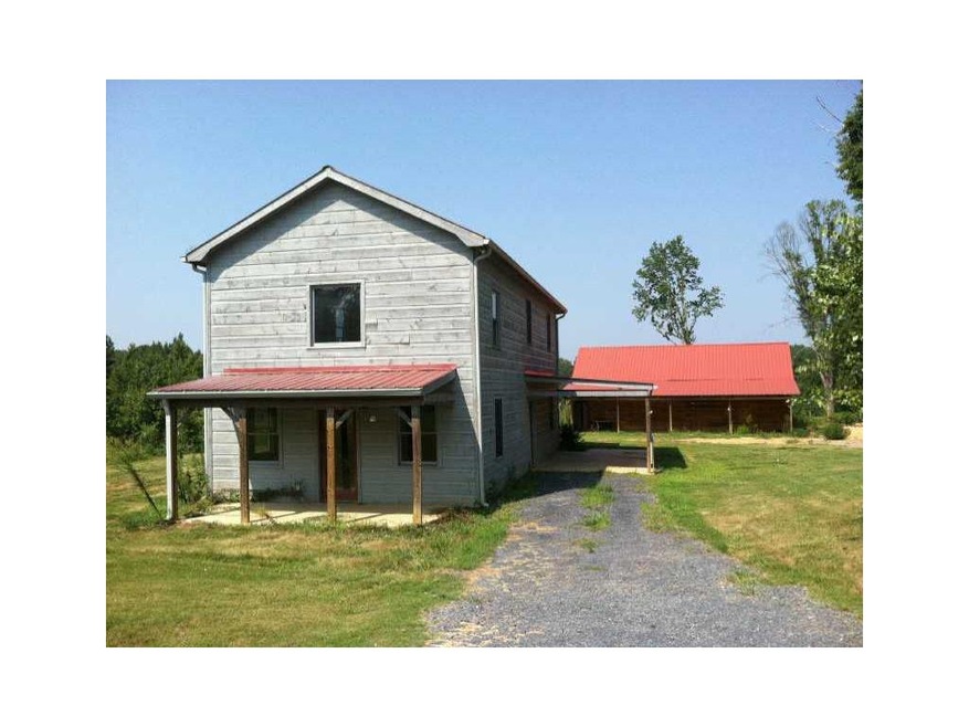Exterior Front. Cute cabin with outbuilding
