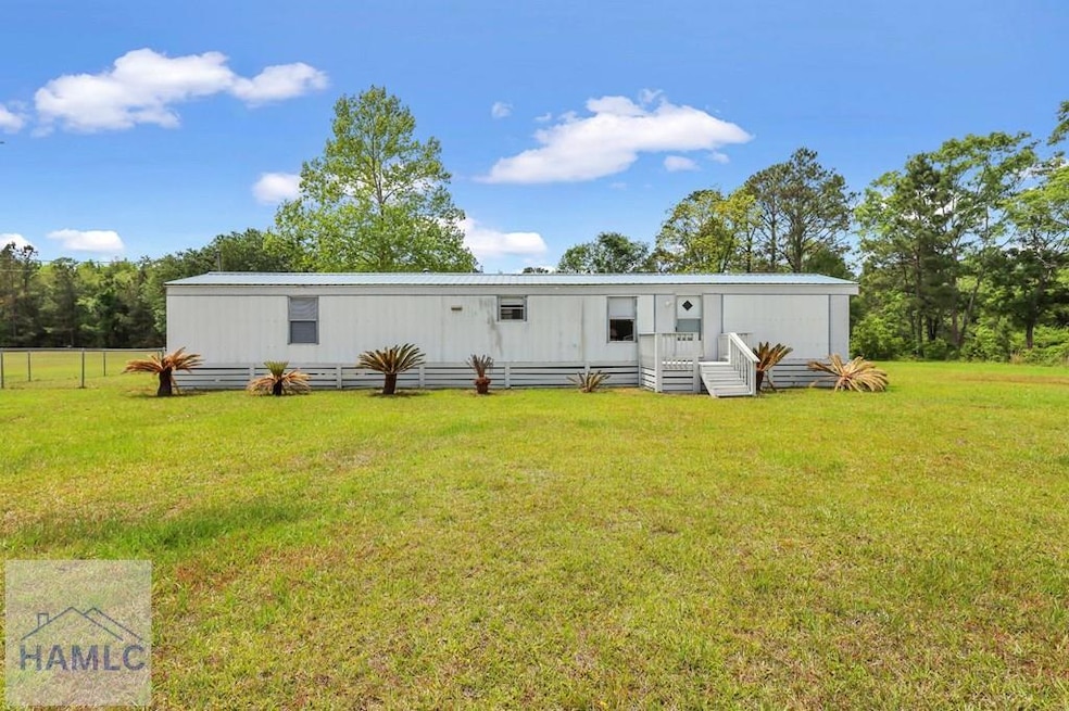 140 Cathy Rd NE, Ludowici, GA 31316 - photo 1