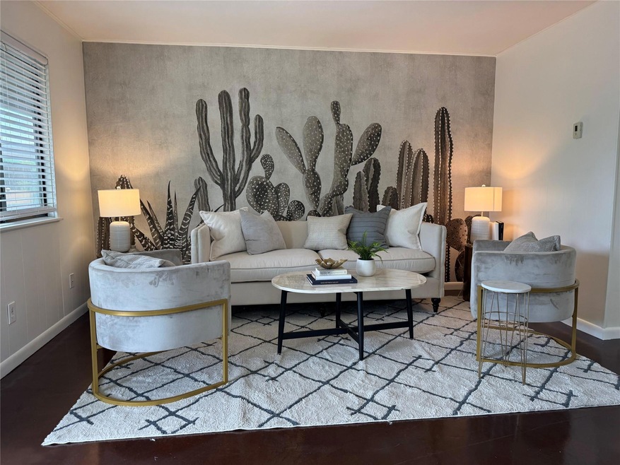 Living room featuring baseboards