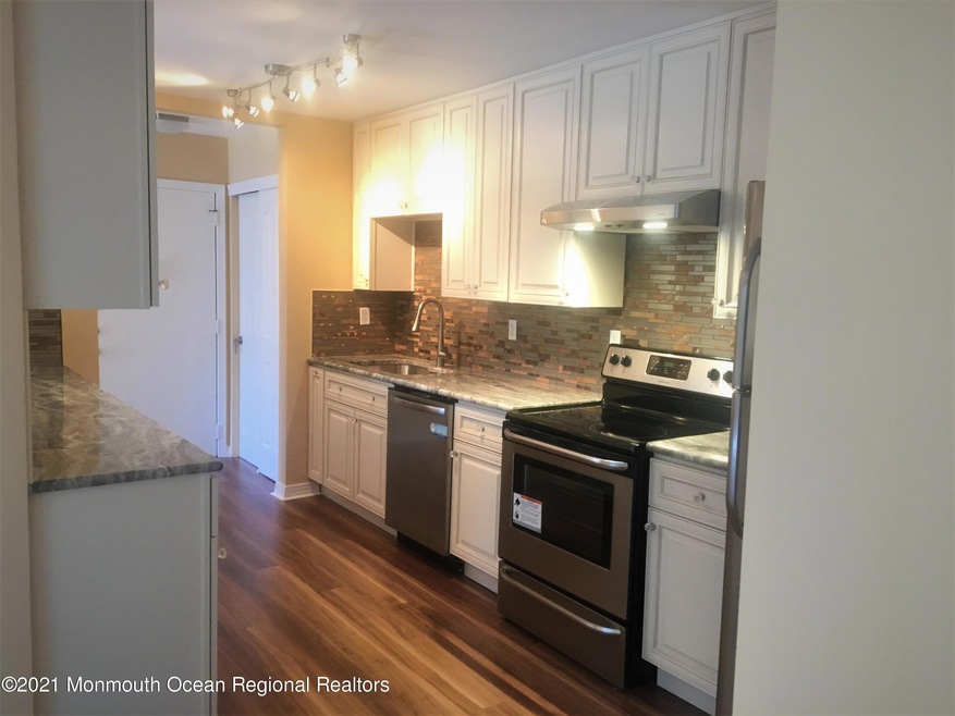 40 Meadow Green Cir unit G, Manalapan, NJ 07726 - photo 1