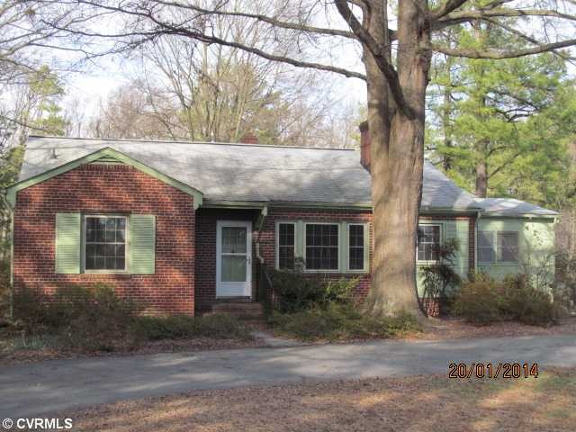 Exterior Front - All Brick rancher with insulated windows and circular paved driveway