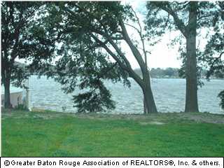 Beautiful oak trees and view of False River