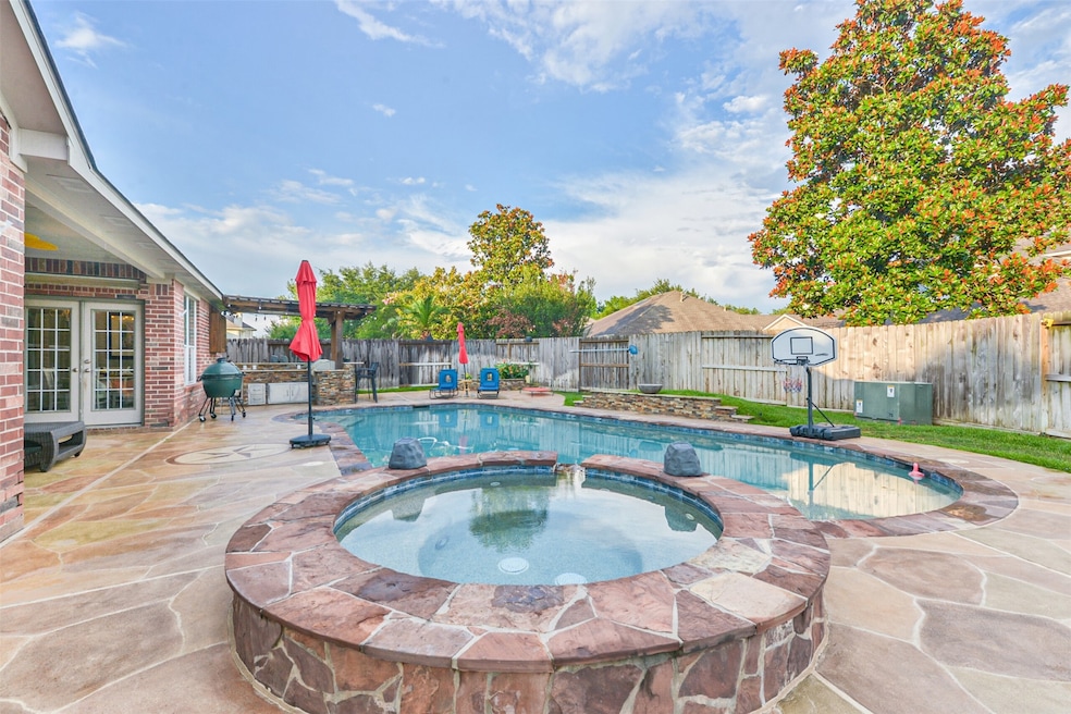It would be an absolute shame not to allow you to peek at this backyard oasis first! Situated on over a quarter of an acre lot, 1031 Longdraw has everything you are looking for in a luxury home... Without the luxury price tag!
