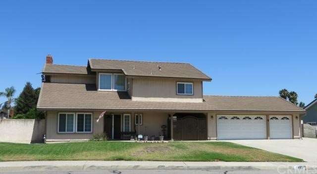 Charming 2-story home with 3-car garage and tile r