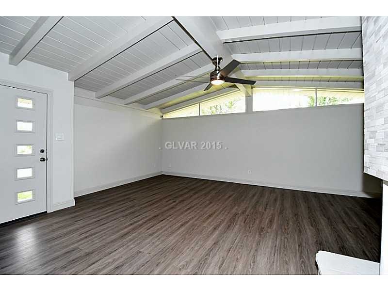 Property Photo. Expansive living room.  Home has a