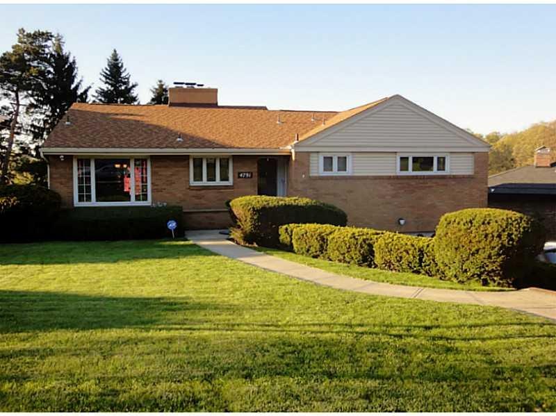 Exterior Front. This level entry mid-century ranch