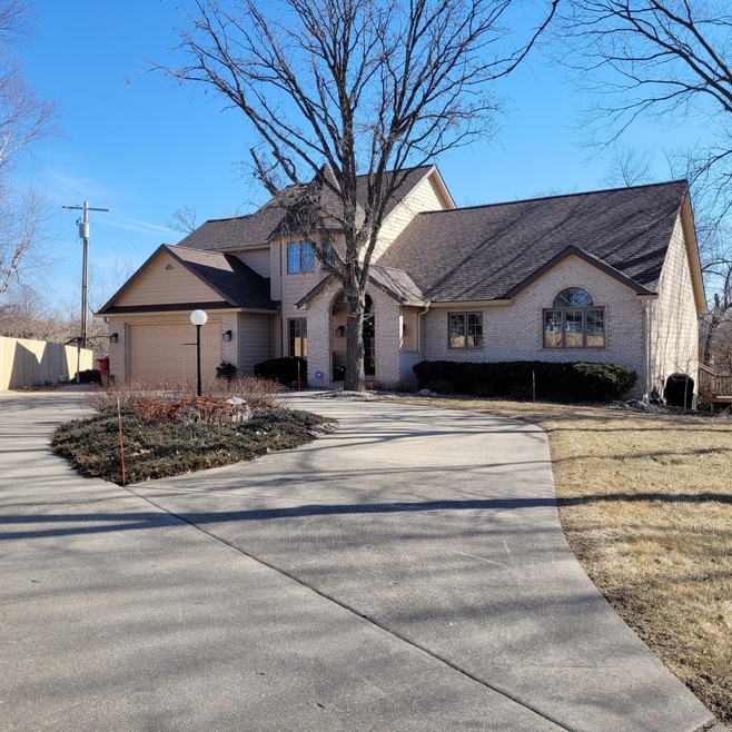 Front of Home with circle drive