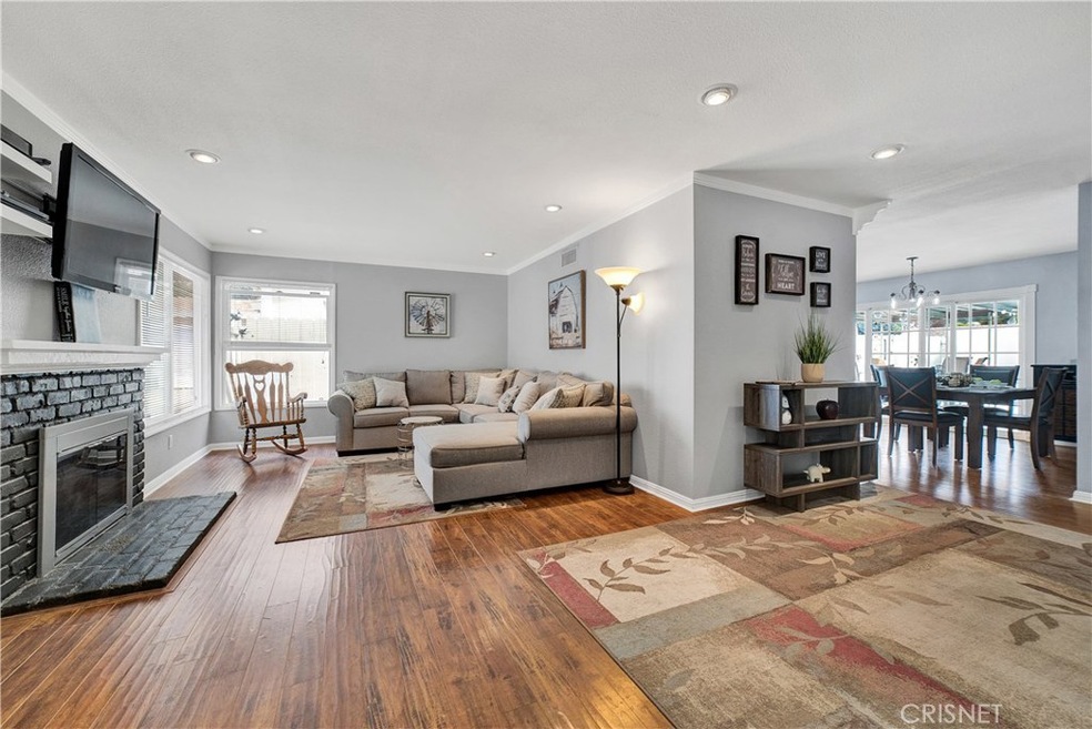 Front Entry into Open Concept Living Room with view of Dining Area.