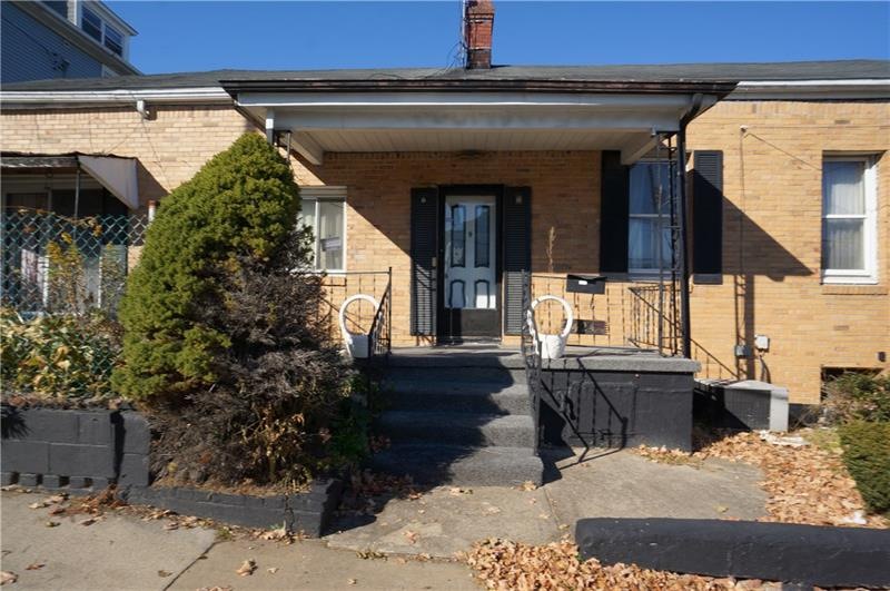 Super cozy front porch...All brick ranch home...be