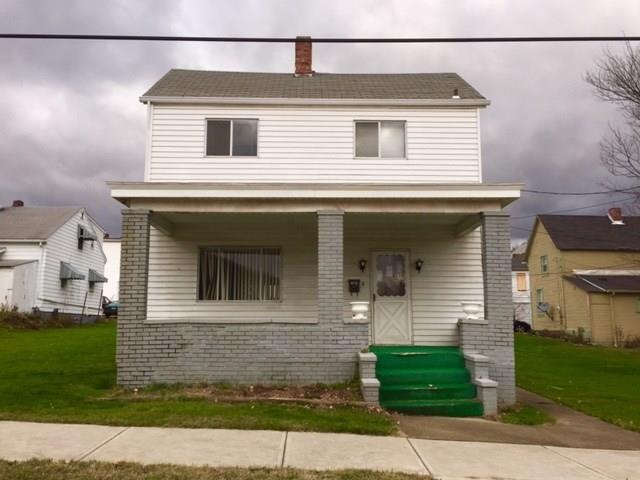 Exterior front view with covered front porch and s