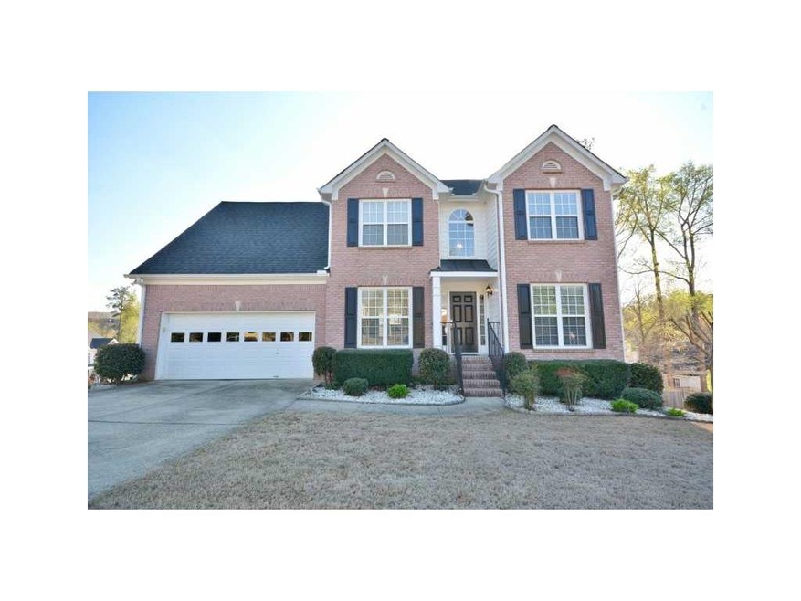 Exterior Front. Brick and Hardie Plank in Active S