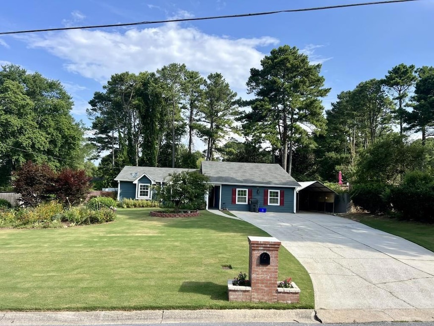 1127 Sawgrass Ct SW, Lilburn, GA 30047 - photo 1