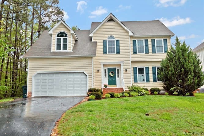 Transitional with vinyl siding, asphalt roof, 2 ca