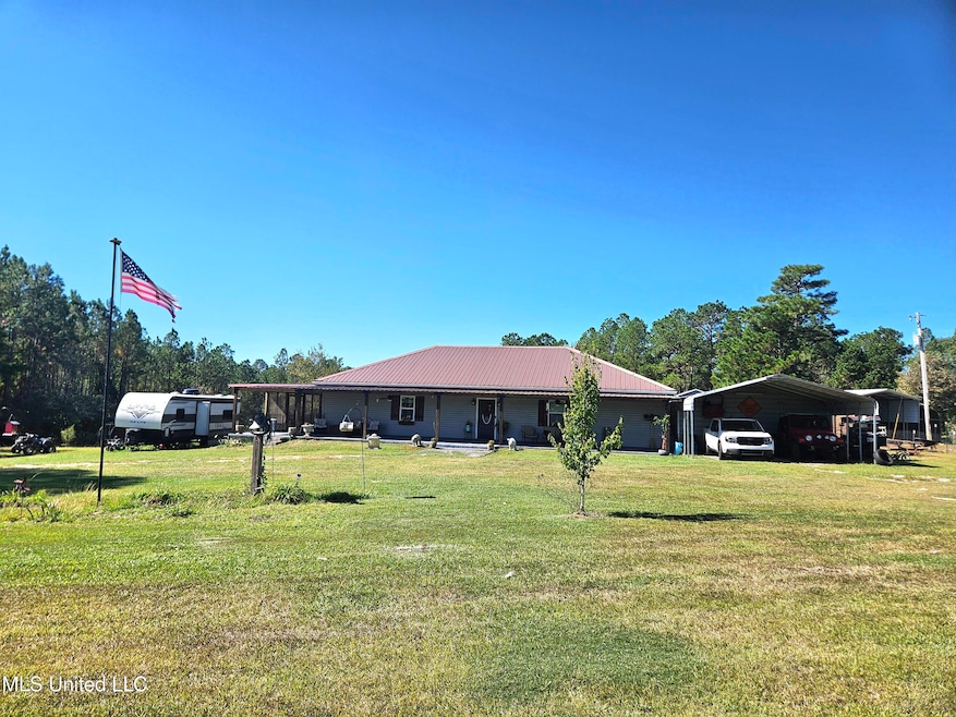 27588 E Lake Cypress Dr, Perkinston, MS 39573 - photo 1
