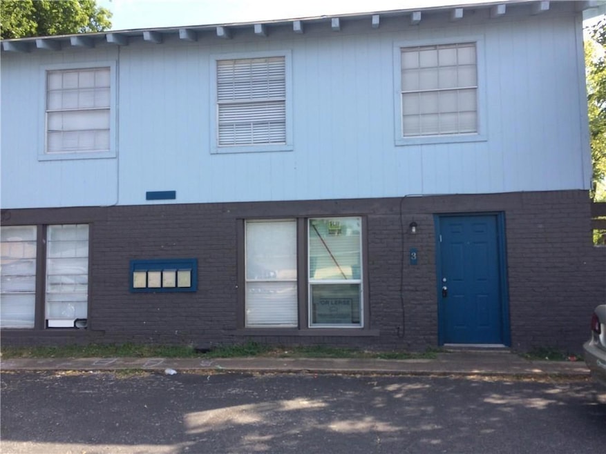 View of front of house featuring brick siding