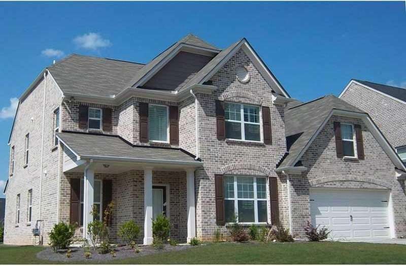Exterior Front. Brick front and sides.