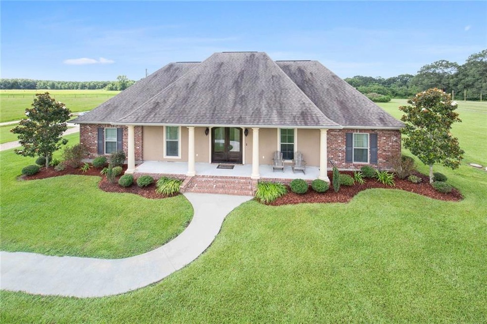 Stunning home on 5.63 acres,  all brick home w/stu