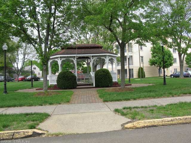 Exterior Front. Gazebo across from entrance to Bui