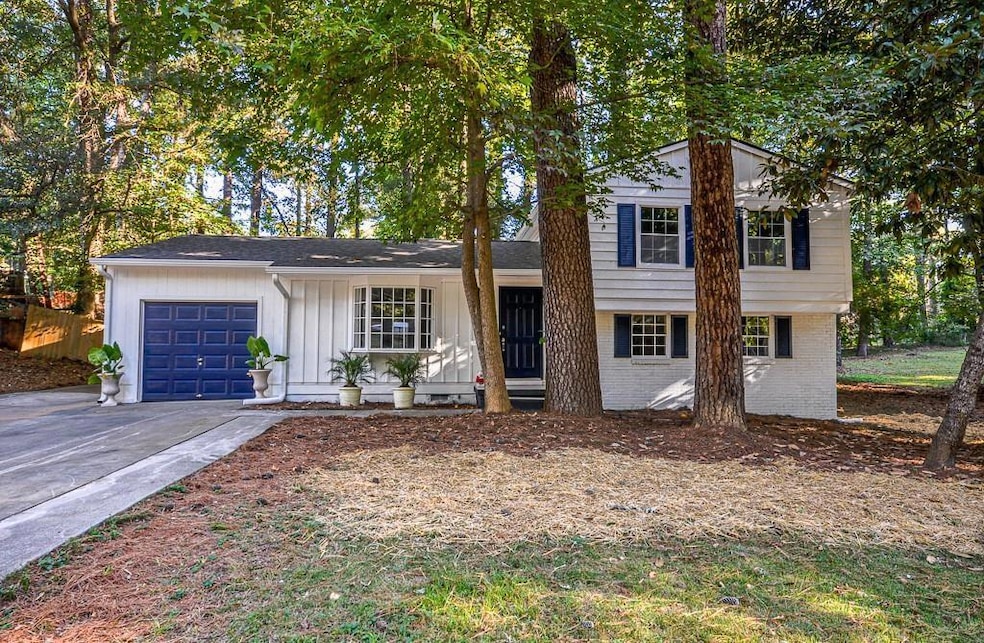 View of front of property with a garage