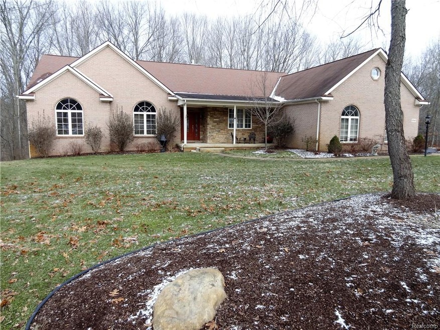 Gorgeous custom ranch on 1-acre lot.