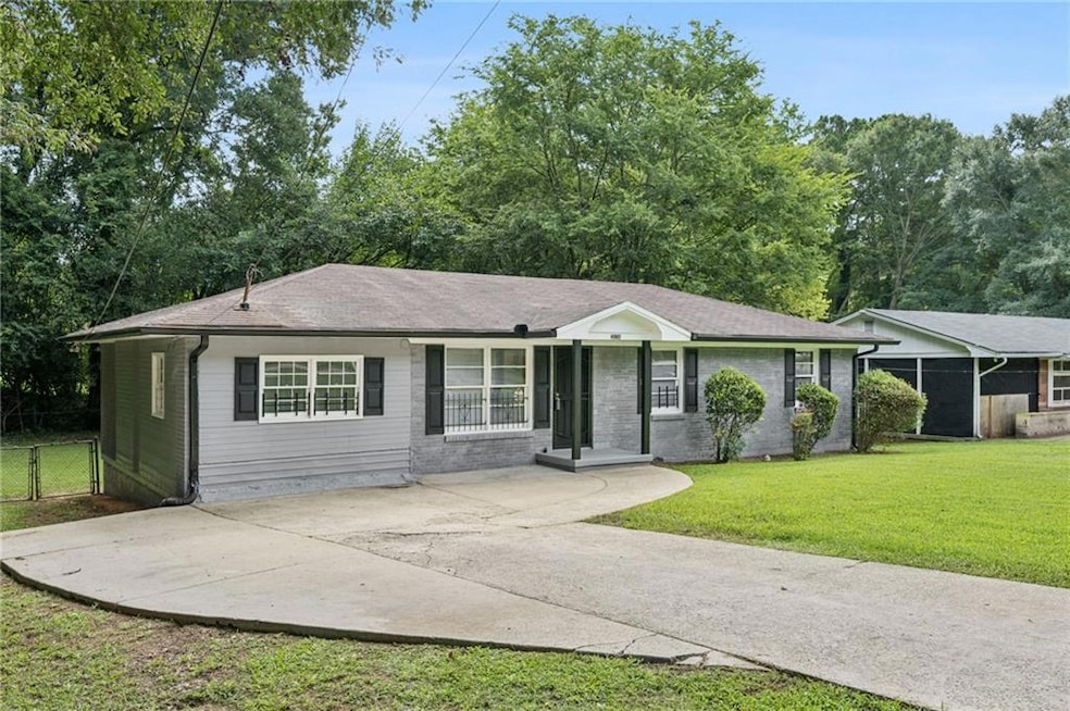 Welcome home to the convenience of a ranch style home. Extra parking thoughtfully added.