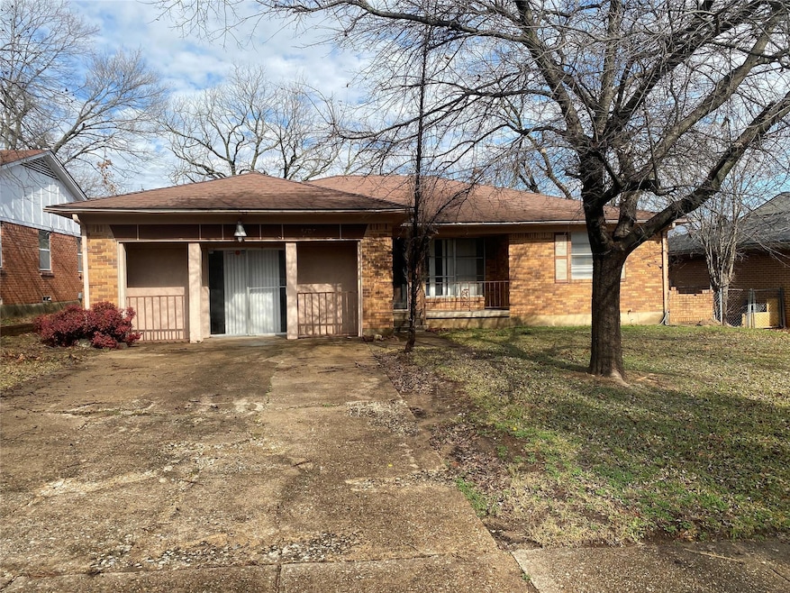 View of front facade featuring covered porch and a