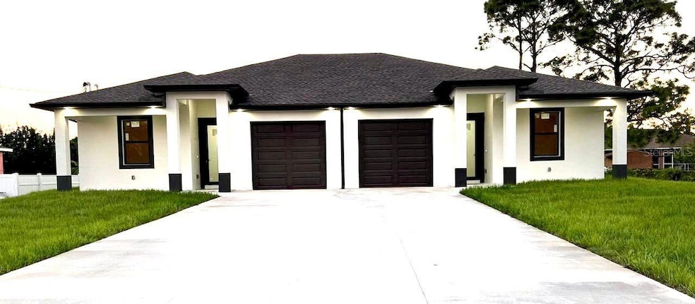 1043 Albany Ave, Lehigh Acres, FL 33971 - photo 1