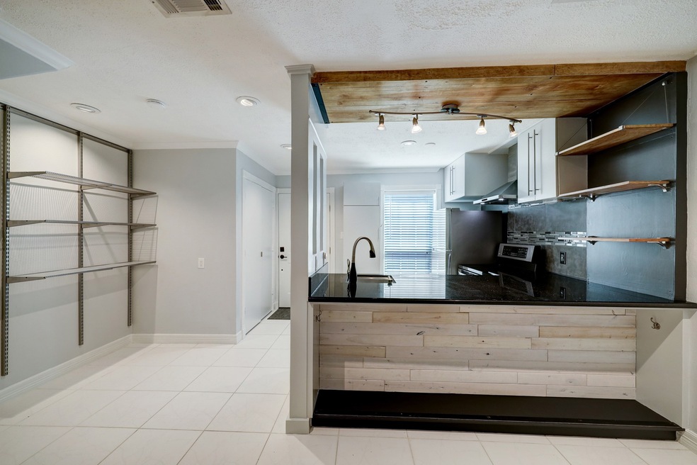 View of the kitchen and dining nook.  Kitchen and