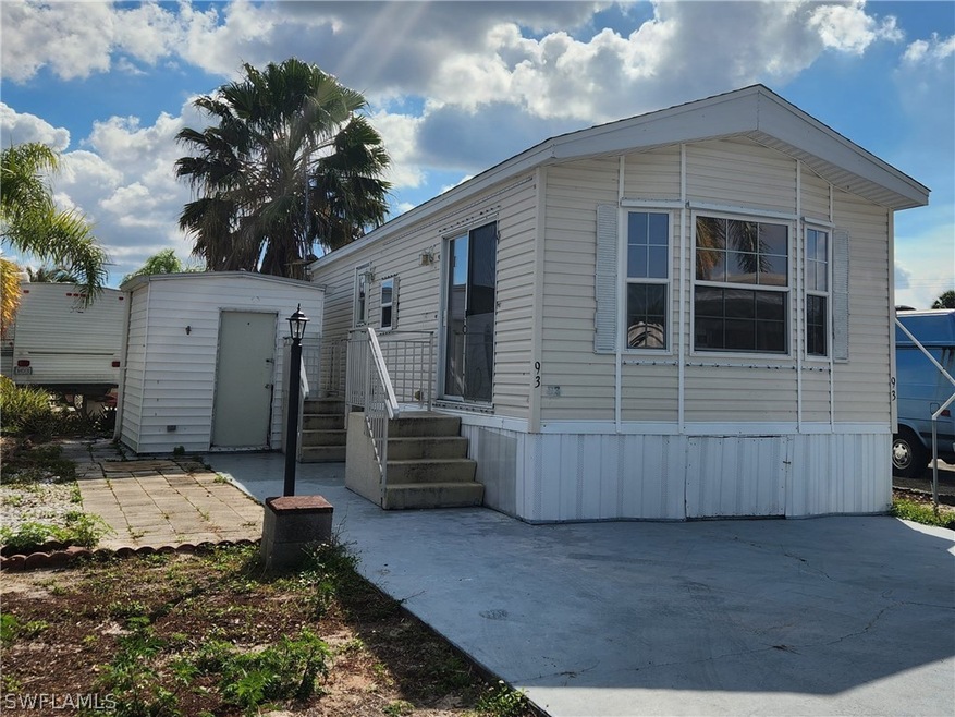 Front view of home with 8X8 storage shed