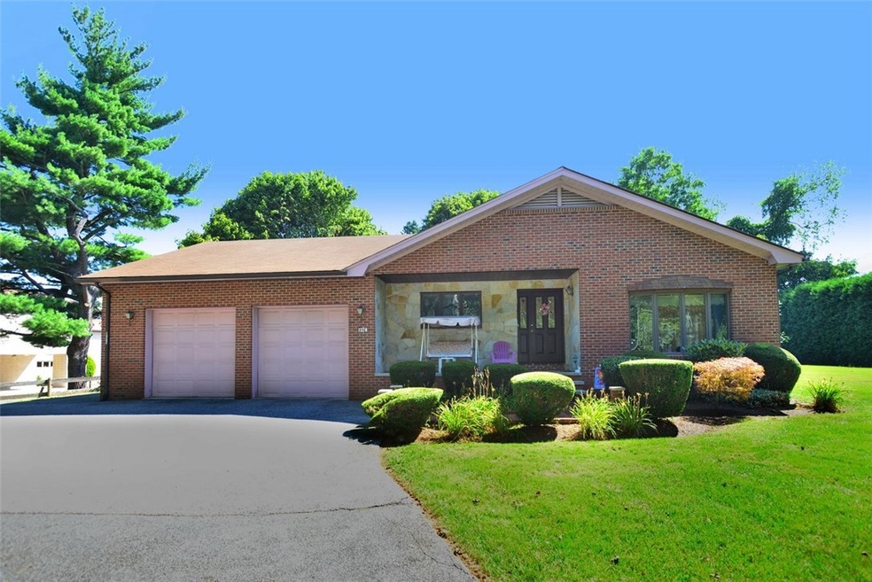 Front view of this handsome custom built home.