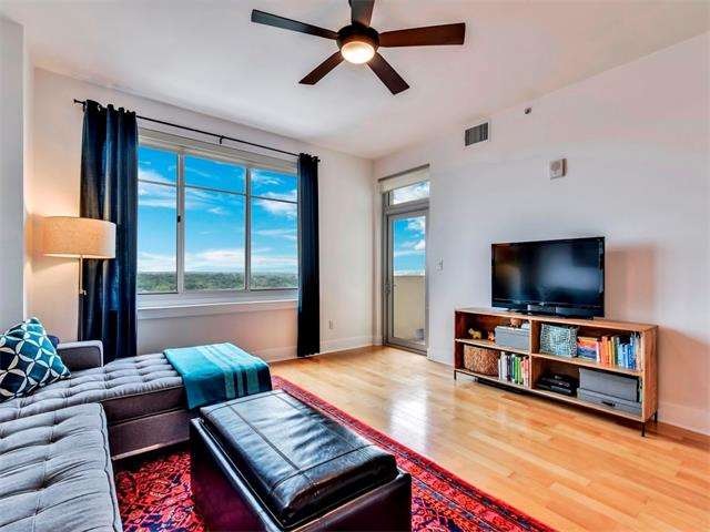 Light and bright the living room has access to the
