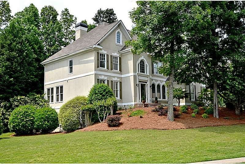 Exterior Front. Stunning custom home with upgrades