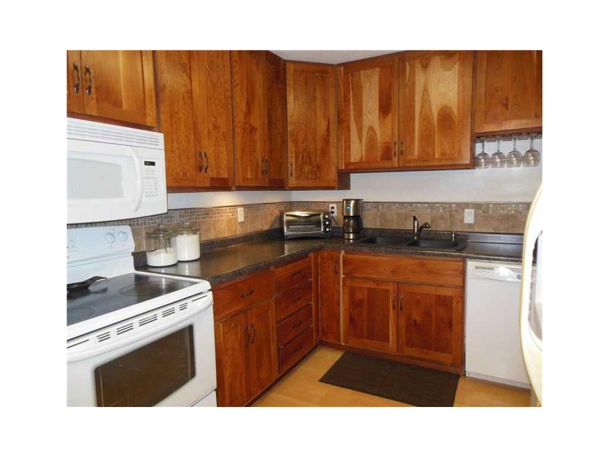 . Beautiful kitchen with Cherry faced cabinets, ba