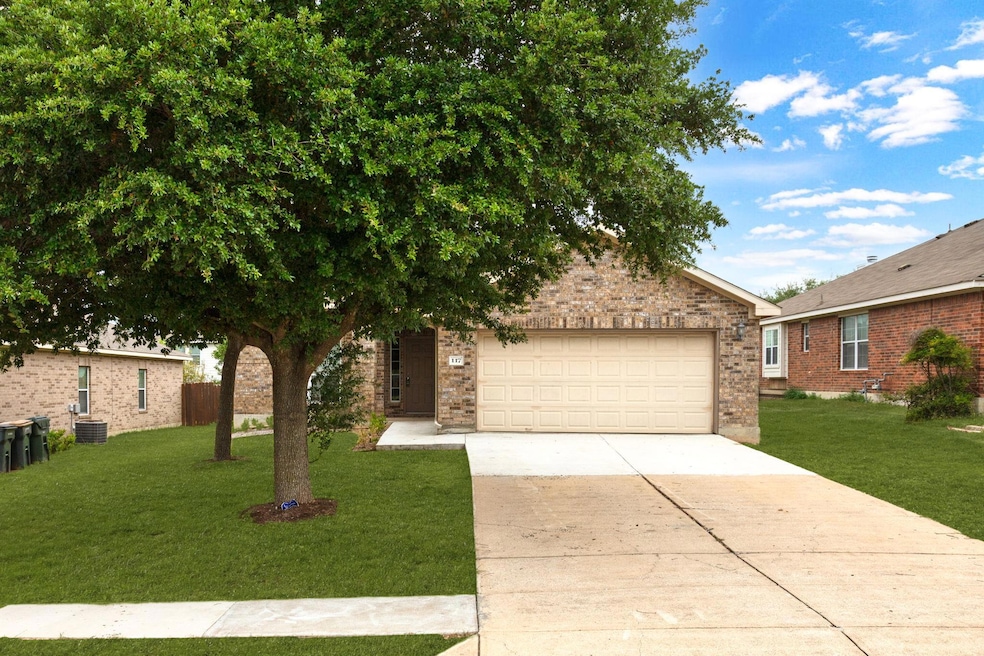 View of front of house featuring a front yard, an