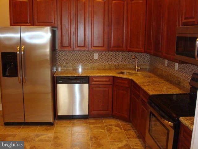 1514 N Caroline St unit 1ST FLOOR APT A, Baltimore, MD 21213 - photo 1