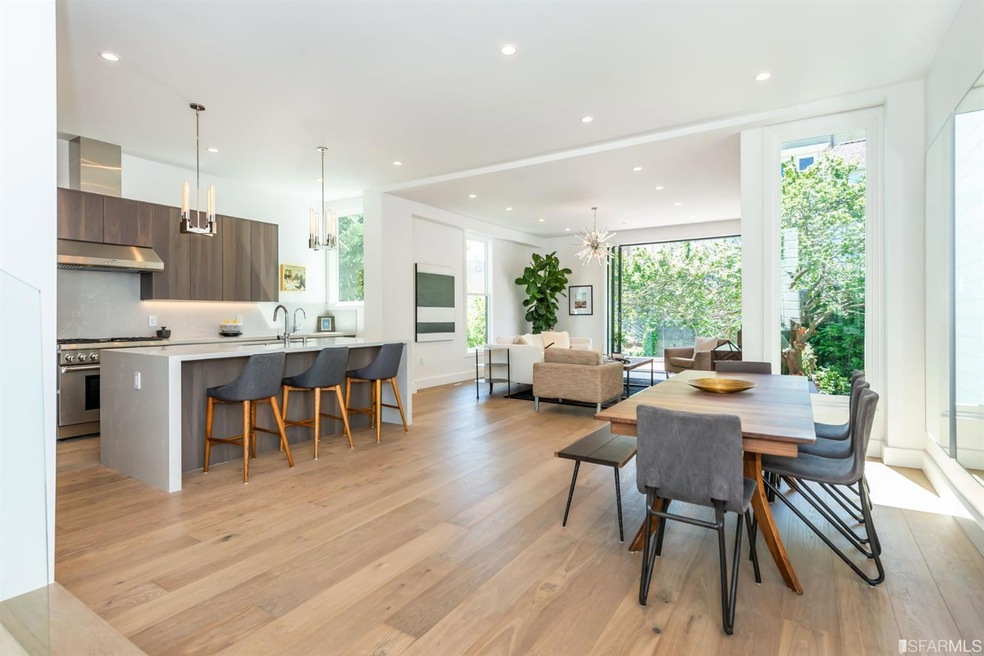 The upper level features soaring vaulted ceilings,