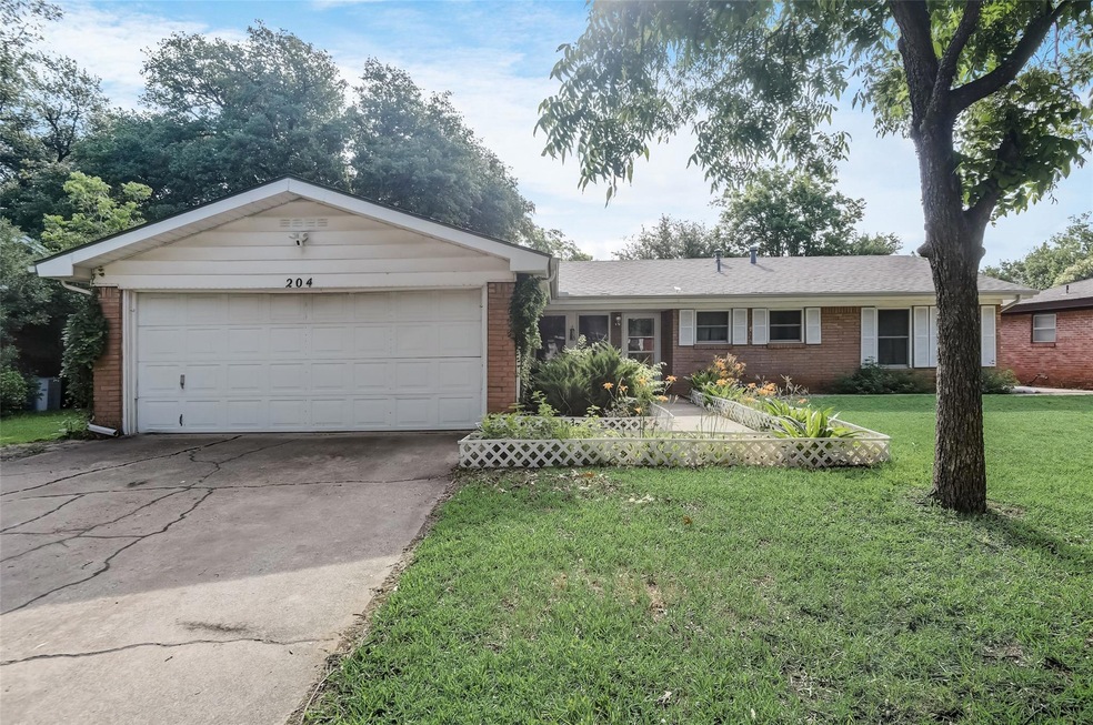 204 Arcadia St, Hurst, TX 76053 - photo 1