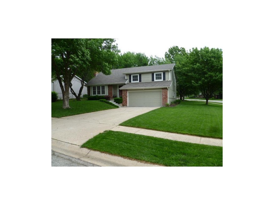Front of home on level corner lot.
