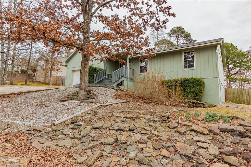 In a fabulous location, this delightful Craftsman-like home will charm you!