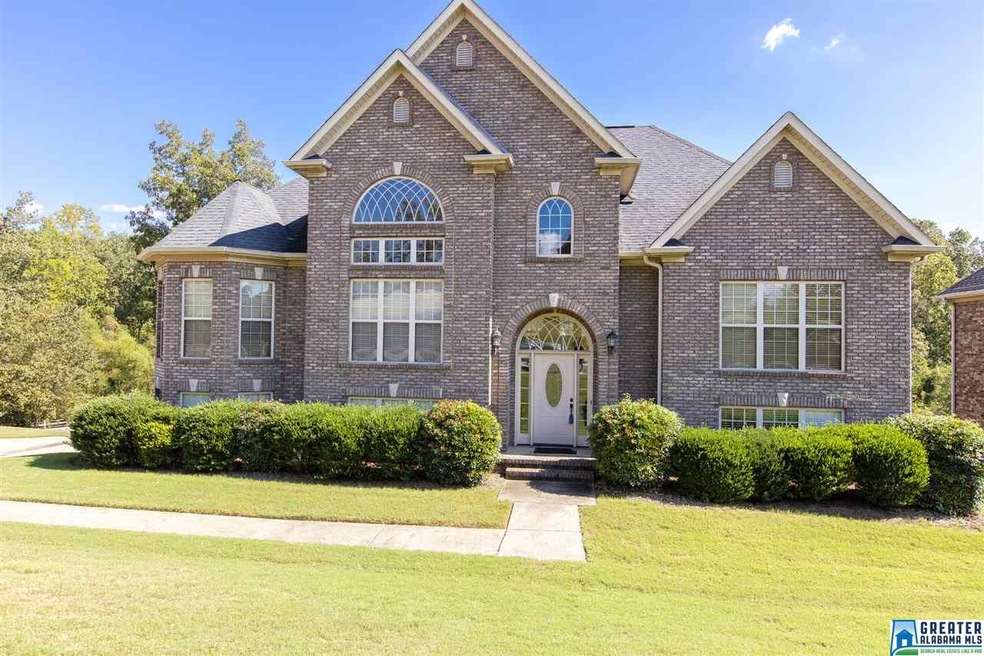 Three sided brick home