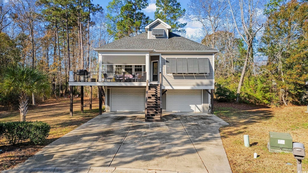 View of front of home featuring a garage