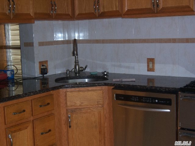 57-41 69th Ln, Flushing, NY 11378 - photo 1