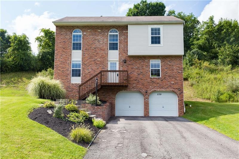 Beautiful brick front home with new landscaping.