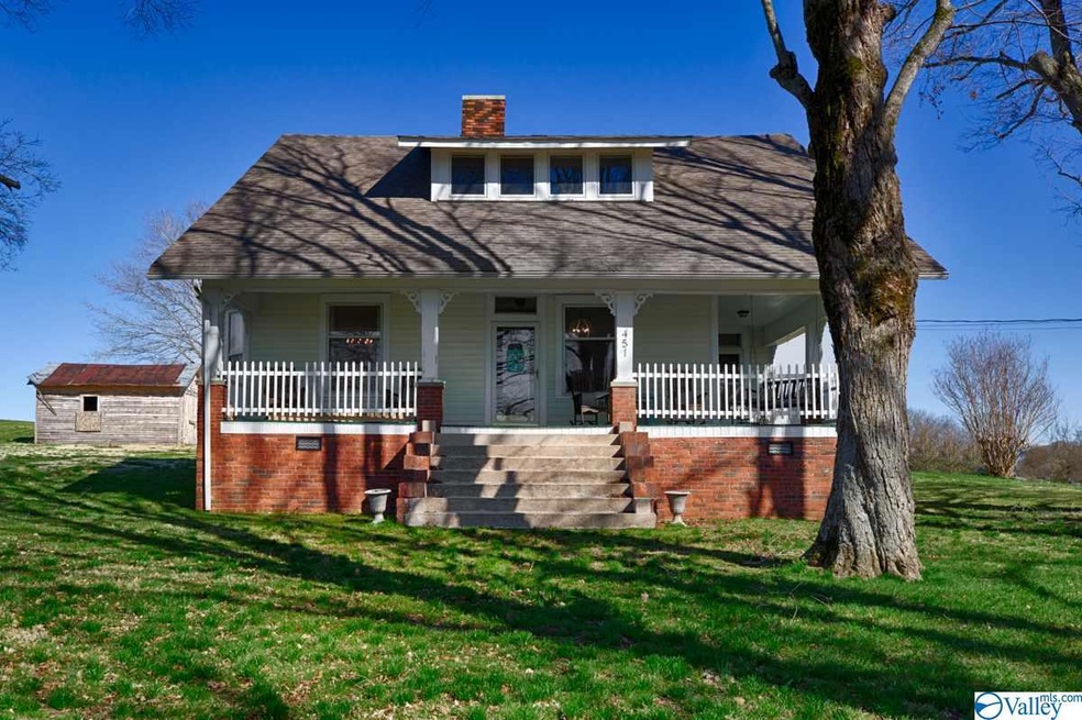 Featuring a covered front porch.