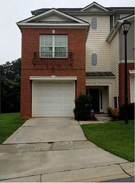 Exterior Front. End Unit, Garage fits 2 cars with 