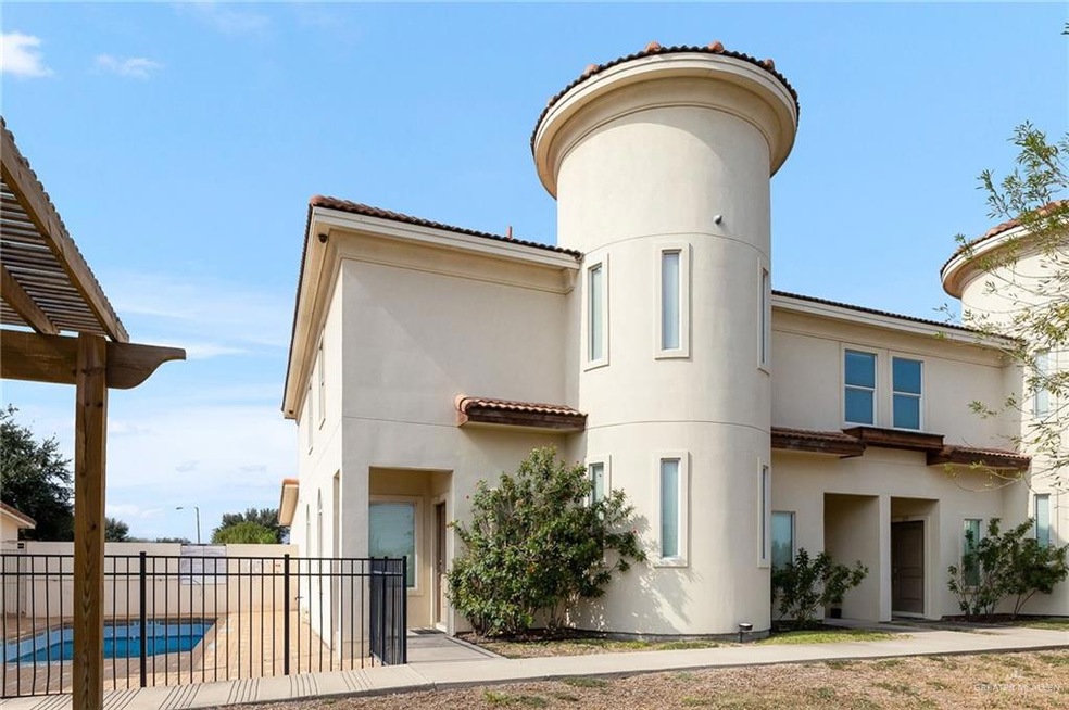 Front of property featuring a fenced in pool
