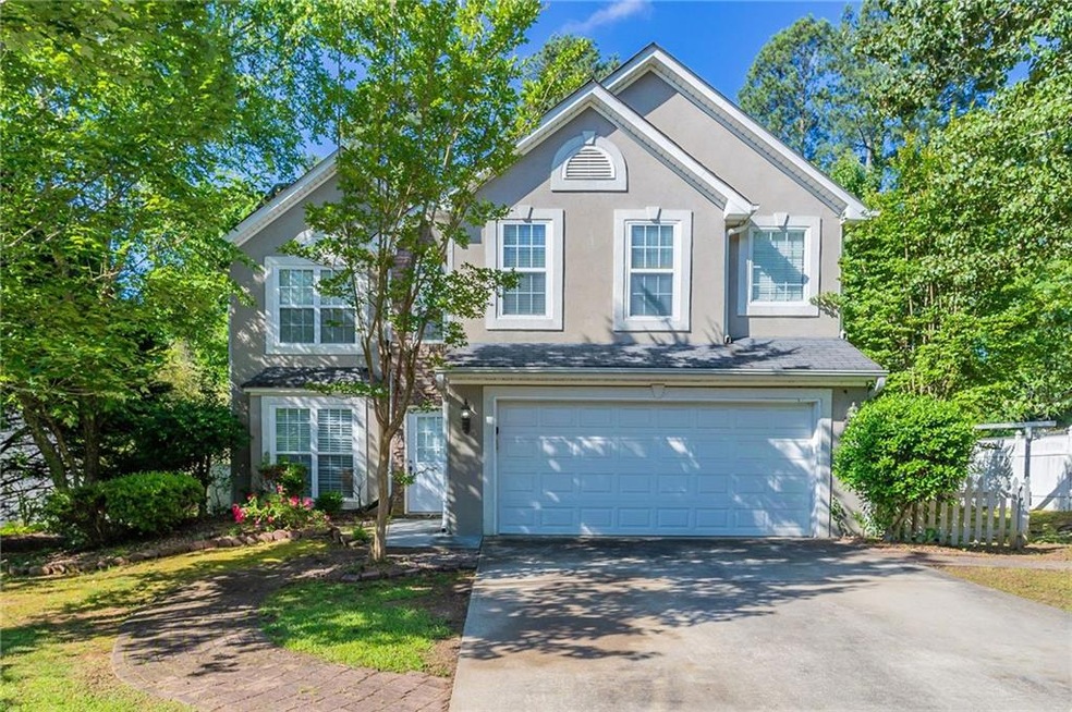 Front of property featuring a garage