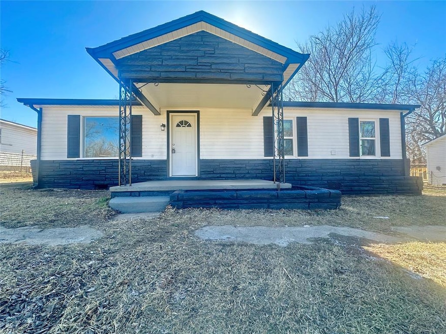 View of front of property featuring a porch
